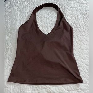2 tops 1 in brown and 1 in white. Very cute. Both in size L.